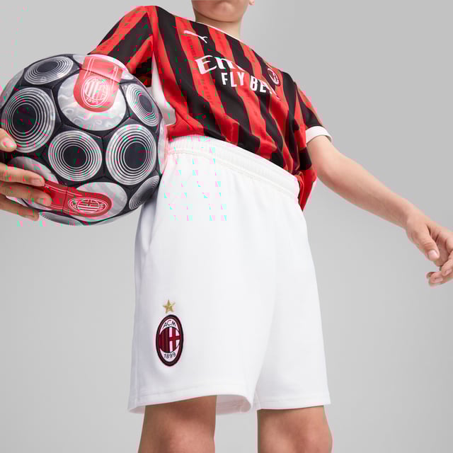PRODUCT STORY: Hit the pitch like AC Milan's finest in these football shorts. They're made from sweat-wicking material to keep you cool in the tensest moments of the game and are finished with the team's famous crest on the leg. FEATURES & BENEFITS: dryCELL: Performance technology designed to wick moisture from the body and keep you free of sweat during exercise; As part of the RE:FIBRE program, this garment is made of at least 95% recycled material from textile waste and other used materials. DETAILS: Regular fit; 170 gsm, Jacquard; Medium rise; Official team branding; PUMA branding details; PUMA Youth: Recommended for older kids between 8 and 16 years.  Our model is 148 cm tall and is wearing size 152 RUS.
