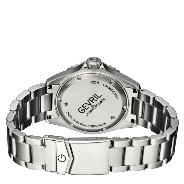 An accessory to success. A distinctive, Swiss-made timepiece is always a sound investment. Artfully reminiscent of the famed New York City skyline, each watch in the Gevril Wall Street Collection commands attention with a stainless steel, architectural design. The unidirectional rotating bezel frames sapphire-doomed, anti-glare crystal. Detailed to perfection, a magnified lens showcases luminous indices and hands on a contrasting dial. Form never suffers to function: each watch is water resistant for up to 200 meters and features a stainless steel bracelet with folding deployment closure. Available in a series of sleek dial colorways, the Wall Street Collection makes a strong statement.

Gevril 4852A Men's Wall Street Stainless Steel Bracelet Watch

Gevril Men's Wall Street Stainless Steel Bracelet Watch
43mm 316L Stainless Steel Satin finish case, Unidirectional rotating bezel
Screw down Crown with Gevril Logo
Luminous indices on dial, Luminous hands, Black Dial, Green Bezel
Date at 3 o'clock Magnified Lens
316L Stainless Steel Oyster Bracelet with folding Deployment Buckle
Anti-reflective Sapphire Crystal
Water Resistant to 200 Meters/20 ATM
Swiss Automatic 3 Hands, SW200 Movement