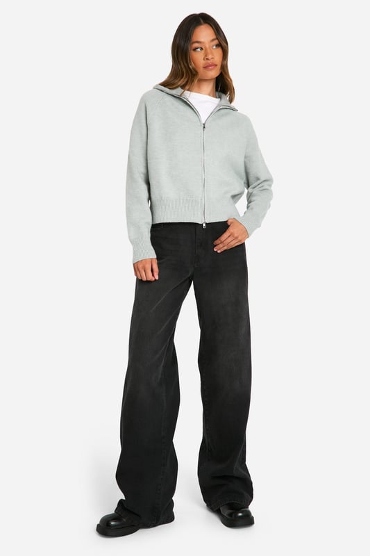 Tall-fit cardigan for extended length and coverage
        Funnel collar design for added warmth and style
        Full-length zip closure for versatile wear
        Ribbed cuffs and hem for a snug fit
        Relaxed silhouette perfect for layering
    
    This tall cardigan with funnel collar and zip is a must-have addition to your casual wardrobe. Its versatile design allows for effortless styling, whether you're heading to a family gathering or a laid-back outing with friends. Layer it over a simple white tee and pair with wide-leg trousers for a chic, comfortable look. The full-length zip offers flexibility, allowing you to adjust your level of warmth throughout the day. For a cosy night in, team it with your favourite leggings and slip-on trainers. The funnel collar adds a touch of sophistication, making it suitable for slightly dressier casual occasions. This cardigan is perfect for those in-between seasons when you need an extra layer without the bulk of a heavy coat. Its relaxed fit ensures comfort without compromising on style, making it a versatile piece you'll reach for time and time again.