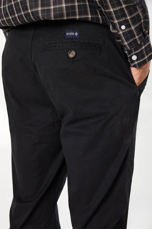 Slim fit design for a modern, tailored silhouette
        Versatile chino style suitable for various occasions
        Clean, streamlined appearance with minimal visible details
        Comfortable cotton-rich fabric for all-day wear
        Subtle branding for a refined look
    
    These Maine Premium Slim Fit Chino Trousers offer a perfect blend of style and comfort for the modern gentleman. The slim fit cut creates a sleek silhouette that flatters the body without compromising on ease of movement. Ideal for both casual outings and smart-casual events, these trousers can be effortlessly dressed up or down. For a relaxed weekend look, pair them with a crisp white t-shirt and trainers. Alternatively, create a more polished ensemble by teaming them with a button-down shirt and leather brogues for a family gathering or casual workplace setting. The versatility of these chinos makes them a wardrobe essential, easily transitioning from day to night. Their timeless design ensures they'll remain a staple in your collection for seasons to come, offering endless styling possibilities for the fashion-conscious man.