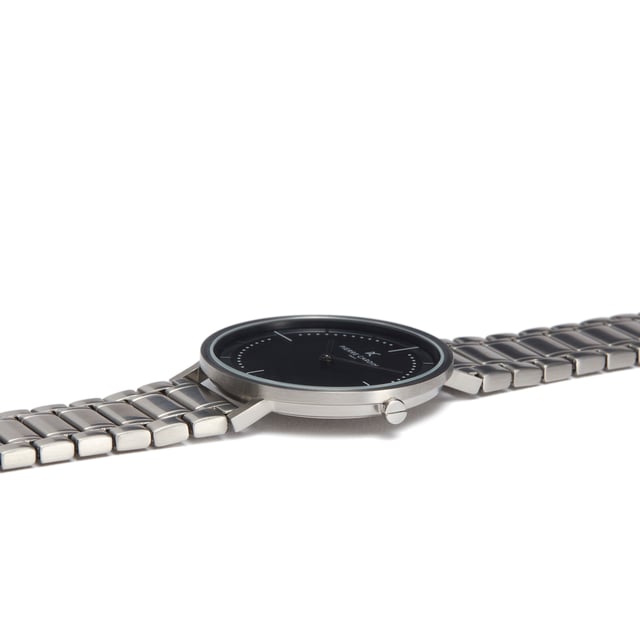 This Pierre Cardin Belleville Park Analogue Watch for Men is the perfect timepiece to wear or to gift. It's Silver 41 mm Round case combined with the comfortable Silver Stainless steel watch band will ensure you enjoy this stunning timepiece without any compromise. Operated by a high quality Quartz movement and water resistant to 3 bars, your watch will keep ticking. This fashionable and classic watch matches any outfit at any occasion,it adds style to your life High quality 21 cm length and  18 mm width Silver Stainless steel strap with a Fold over with push button clasp Case diameter: 41 mm,case thickness: 5.8 mm, case colour: Silver and dial colour: Black