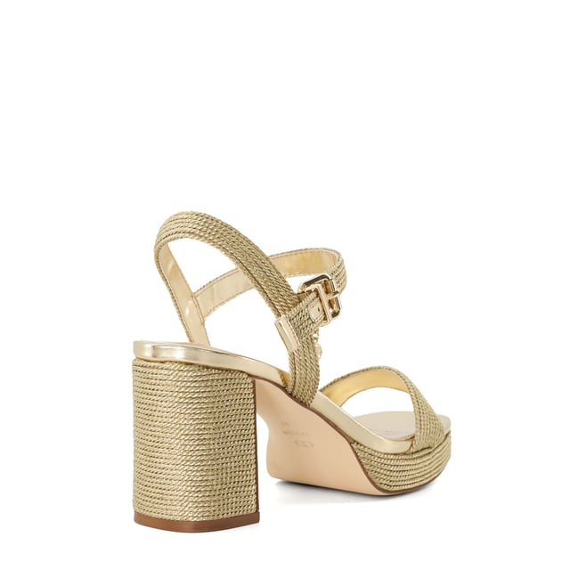 Give your look a glamorous edge with Kolden  metallic braided wedge sandals. Designed with a high wedge heel and a classic sandal toe  this style is ideal for weddings  weekend plans  and beyond. Featuring a gold-tone buckle closure and crossover straps.