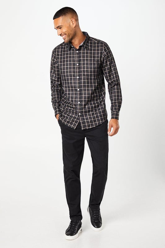 Slim fit design for a modern, tailored silhouette
        Versatile chino style suitable for various occasions
        Clean, streamlined appearance with minimal visible details
        Comfortable cotton-rich fabric for all-day wear
        Subtle branding for a refined look
    
    These Maine Premium Slim Fit Chino Trousers offer a perfect blend of style and comfort for the modern gentleman. The slim fit cut creates a sleek silhouette that flatters the body without compromising on ease of movement. Ideal for both casual outings and smart-casual events, these trousers can be effortlessly dressed up or down. For a relaxed weekend look, pair them with a crisp white t-shirt and trainers. Alternatively, create a more polished ensemble by teaming them with a button-down shirt and leather brogues for a family gathering or casual workplace setting. The versatility of these chinos makes them a wardrobe essential, easily transitioning from day to night. Their timeless design ensures they'll remain a staple in your collection for seasons to come, offering endless styling possibilities for the fashion-conscious man.
