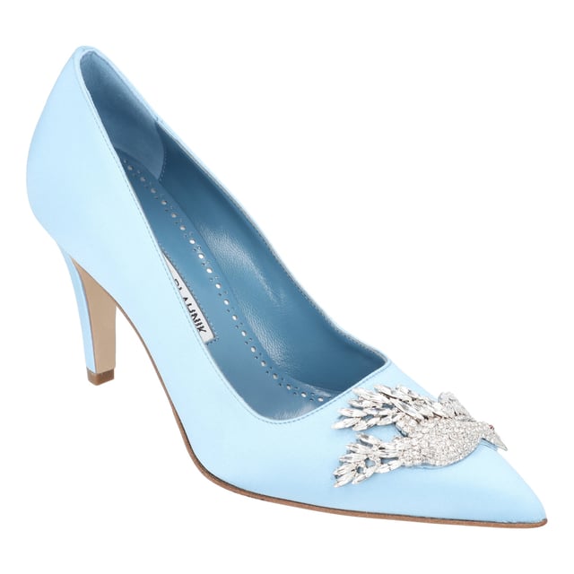 Light blue satin pumps from Manolo Blahnik. The Palos pumps are made of light blue satin, featuring a clear crystal dove embellishment with red embellished eye detail, set on a block high heel measuring 90mm.
Leather sole
True to size
Made in Italy
Measurements: 
Height: 90 mm
