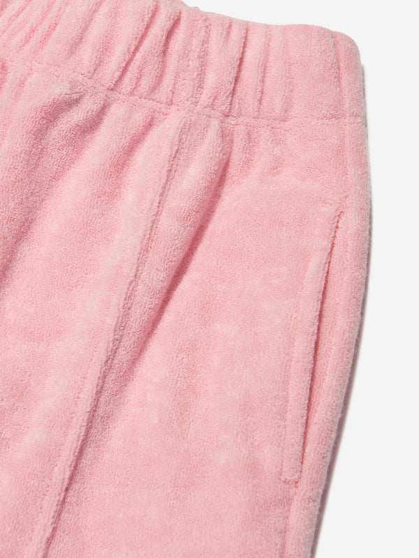 Comfort and style converge for these girls pink knit trousers from AY by Ayla. Designed for young influencers, this cosy fleece piece is made for dreaming big and feeling good, all with a fashionable twist. Pair with the matching zip-up hoodie for a cool coordinated look. Elasticated Waistband 2 Side Pockets