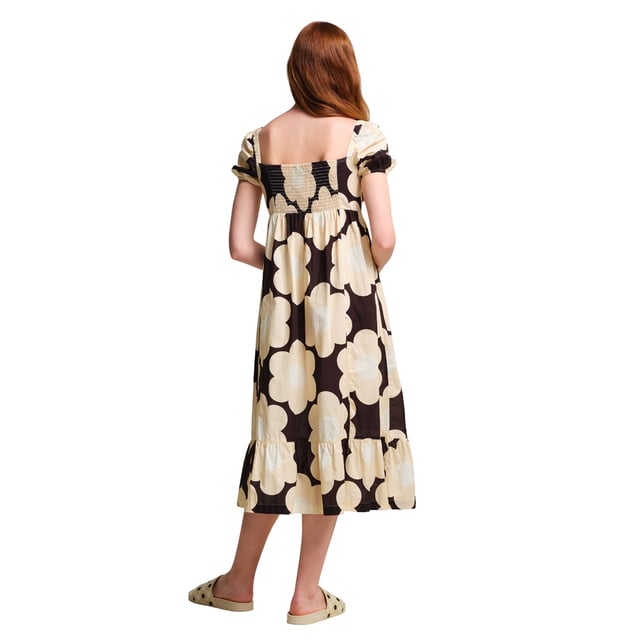 100% Cotton. Fabric: Coolweave, Poplin. Design: All-Over Print, Daisy. Fabric Technology: Breathable. Back Elasticated, Gathered Panel. Neckline: Square Neck. Sleeve-Type: Balloon, Short-Sleeved. Sustainability: Sustainable Materials. 8 UK: 32 in. 10 UK: 34 in. 12 UK: 36 in. 14 UK: 38 in. 20 UK: 45 in. 18 UK: 43 in. 16 UK: 40 in.