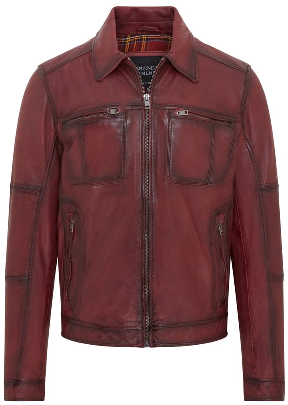 This Harrington biker jacket is a timeless classic, crafted from premium lamb leather with a vintage rub-off finish for a distinctive, worn-in look. Designed with functionality and style in mind, it features four outer zipped pockets and two internal pockets for practicality, along with a soft cotton lining for added comfort. The jacket’s sleek design, durable construction, and retro vibe make it an ideal choice for both casual outings and biker enthusiasts.

Premium lamb leather with a unique vintage rub-off finish.
Soft cotton lining for maximum comfort.
Four outer zipped pockets and two internal pockets for ample storage.
Classic Harrington collar for timeless style.
Durable front zip closure for easy wear.
Perfect for casual wear or adding a retro touch to your wardrobe.