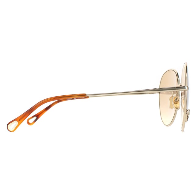 Las gafas de sol Chloe Round Womens Gold Brown Light Gold Mirror Ch0027S son un bonito estilo redondo fabricado en metal ligero. Las plaquetas nasales de silicona garantizan la comodidad durante todo el día, mientras que el logotipo de Chloe en el interior de las patillas -tips de autenticidad.