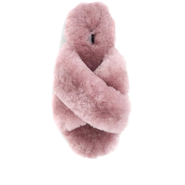 Our Dory slippers are primed for duvet days and WFH days. Crafted in luxuriously soft sheepskin both inside and out, Dory offers unmatched and all-encompassing comfort. Made for comfortable and elegant wear around the house, the fluffy slippers are based on a lightweight and flexible sole. You'll find yourself reaching for Dory as soon as you step through the front door.