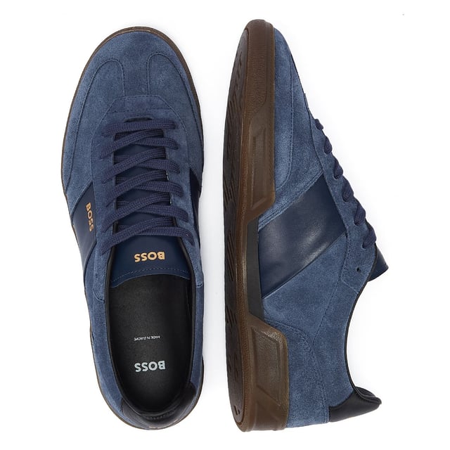 Step into elegance with these low top tennis shoes, crafted from premium 100% cowhide suede leather. Finished with embossed branding to the sole and the tongue.'