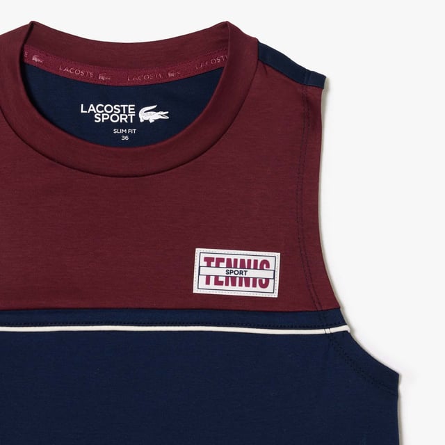 Lacoste Sport Contrast Mouwloos T-shirt voor dames. Ga voor groots contrast en groots comfort in dit rekbare, ademende en vochtafvoerende T-shirt. Ontworpen om je op jouw manier te laten presteren.- Stretch katoen.- Slank, getailleerd model.- Sneldrogend.- Getest door atleten.- Siliconen krokodil op voorkant.- 100% Katoen. Machinewasbaar. Ref: TF1010R1I.