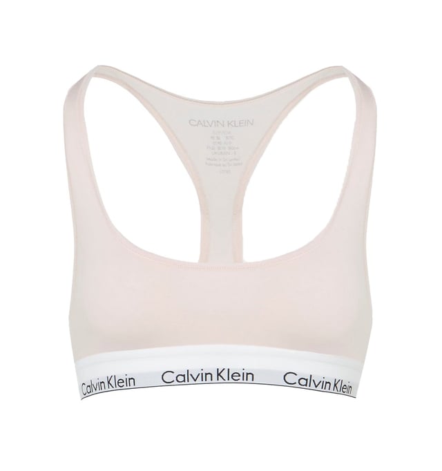 Discover the new Modern Cotton range from Calvin Klein! This bralette is non-wired for additional comfort, yet still strong and supportive, thanks to an elasticated underband. It is also non-padded for a natural look and feel. Offering true freedom in the form of a comfortable and contemporary fit and feel, paired with chic, feminine styling, this beautiful bralette is certainly not one to miss out on!

Designed to be gentle whilst giving freedom of movement
Cotton modal blend
No cups, unlined
No padding
Racerback styling
Supportive elastic underband
CALVIN KLEIN signature elastic underband
Composition: 53% Cotton | 35% Modal | 12% Elastane
Listed in UK sizes