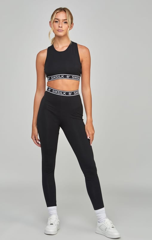 inchBlack Essential Tape BraletteSoft touchCropped fitTaped20% recycled cottonRacerbackTape hemMachine wash92% Cotton  8% Elastane inch