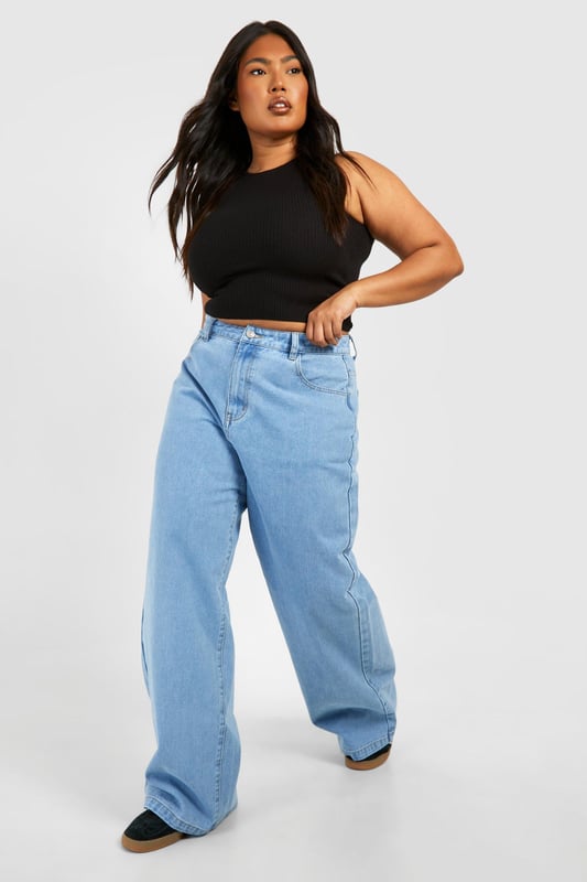 We've got your dream jeans covered with this latest pair from our plus size jeans collection. Made from a rigid denim that can be dressed up or down, these wardrobe staples are made with extra fabric to ensure the perfect fit. Pair with a relaxed-fit hoodie for off-duty days or team with a sparkly top and statement heels for a killer jeans-and-a-nice-top combo. Want more inspo? When it comes to versatile denim, plus size high waisted jeans are a perfect to show off your curves and flatter your waistline, just wear them with cropped jumpers or oversized t shirts. Style: Wide Leg JeansFabric: DenimModel's height: 170cm / 5'7"