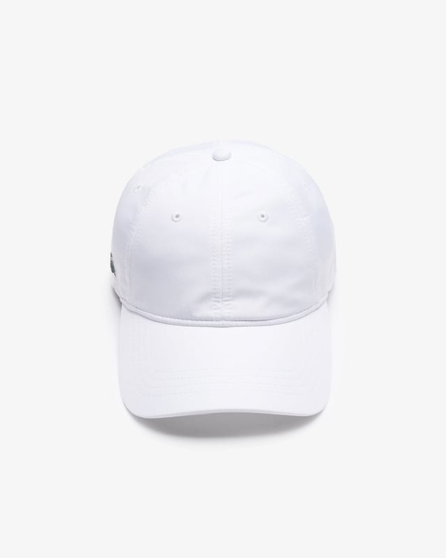 Simplicity and performance are the hallmarks of the lightweight solid-coloured taffeta Lacoste Sport cap. Featuring breathable eyelets and an adjustable strap in the back, this perfectly comfortable protective accessory is available in several modern shades. Wear it both in town and to practice.
Taffeta: Smooth, very light weaved fabric with a slightly shiny finishAdjustable strapBreathable eyeletsDecorative overstitchingGreen crocodile transfer on sideMain fabric: Polyester (100%) / Outer layer: Polyester (100%) / Inner layer: Polyester (100%) / Inner sweatband: Cotton (100%) / Front lining: Polyester (100%)
RK2662
 