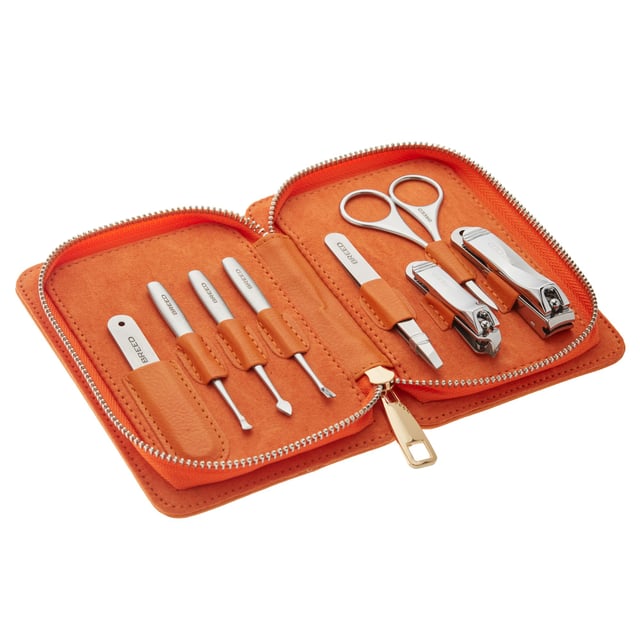 SPECS: 8-piece set, Surgical Stainless steel tools; INCLUDED: Heavy duty zip up travel case, Fingernail clippers, Toenail clippers, Nail file, Nostril + Eyebrow scissors, Peeling Knife, Cuticle Knife, Deadskin Fork, Tweezers