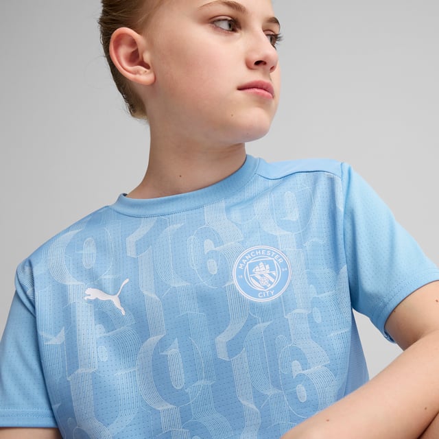 PRODUCT STORY: Train like the champions in this official Manchester City Pre-match Short Sleeve jersey. With a regular-fit, crew neck and our sweat-wicking dryCELL tech, it's tailored for optimal pre-match focus. It features Manchester City details, so you can represent the team with pride. FEATURES & BENEFITS: dryCELL: Performance technology designed to wick moisture from the body and keep you free of sweat during exercise; Made with 100% recycled material excluding trims & decorations. DETAILS: Regular fit; 145 gsm, Jersey; Crew neck; Short sleeves; Official team branding; PUMA Youth: Recommended for older kids between 8 and 16 years.