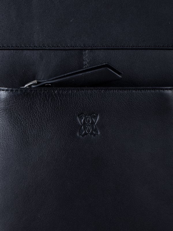 The Talkin handbag collection is a study in sleek sophistication, and this practical backpack is no exception. Crafted from soft premium leather, this classic design has plenty of space to ensure you can carry all your essentials with ease. The adjustable leather straps offer unparalleled comfort, and we've included a grab handle for convenient carrying.