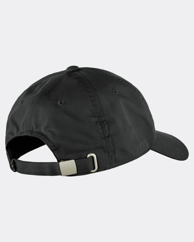 Fjällräven Logo Cap
When the sun is beating down, this cap will provide you with welcome shade and help you keep your cool. Made from G-1000 Lite in recycled polyester and organic cotton, it is lightweight and breathable in hot weather. Plain and simple with a small 1960 logo on the left front – the year that Fjällräven was founded. 

Comfortable cap in light and airy G-1000 Lite.
Made from recycled polyester and organic cotton.
Lightweight and breathable with embroidered ventilation holes.
Adjustable with a metal clasp at the back.
1960 logo on the left front.
Durable
hand wash
do not dry clean
do not tumble dry
do not bleach
do not iron
wash separately
G-1000® Lite: 65% polyester (recycled), 35% cotton (organic)

F13100181