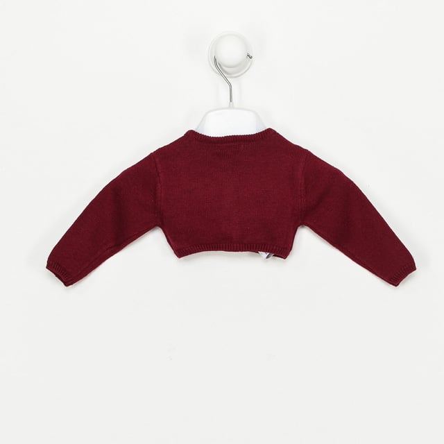 Tricot knit jacket.
 Closed round neck.
 Button closure on the front.
 Embroidered relief details.
 Brand name embroidered on the lower front side.
 Composition: 75% Cotton, 20% Polyamide, 5% Wool
 Care:
Wash maximum at 30ºC.
 -Do not iron.
 - It is not allowed to use a dryer.
 - Do not use bleach.
 - Does not support dry cleaning.