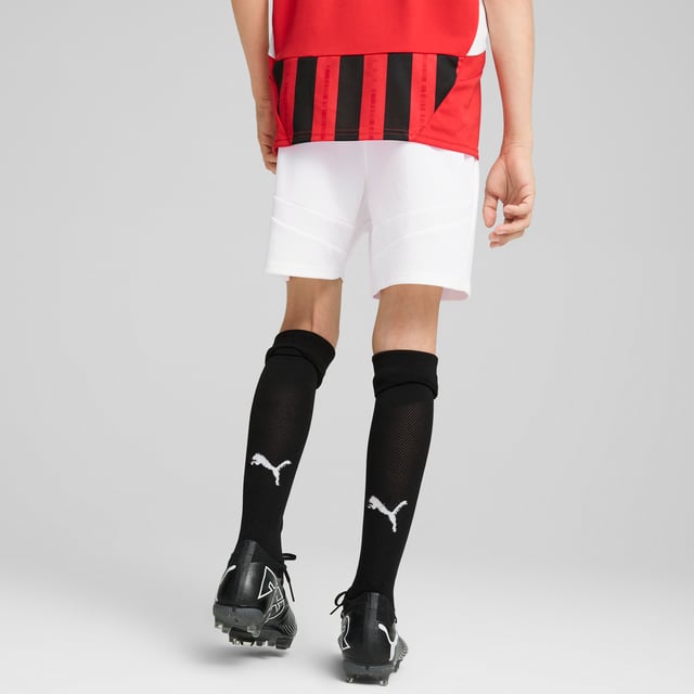PRODUCT STORY: Hit the pitch like AC Milan's finest in these football shorts. They're made from sweat-wicking material to keep you cool in the tensest moments of the game and are finished with the team's famous crest on the leg. FEATURES & BENEFITS: dryCELL: Performance technology designed to wick moisture from the body and keep you free of sweat during exercise; As part of the RE:FIBRE program, this garment is made of at least 95% recycled material from textile waste and other used materials. DETAILS: Regular fit; 170 gsm, Jacquard; Medium rise; Official team branding; PUMA branding details; PUMA Youth: Recommended for older kids between 8 and 16 years.  Our model is 148 cm tall and is wearing size 152 RUS.