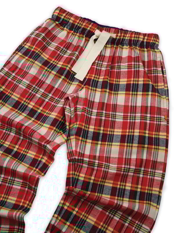 Red / Beige / Navy Brushed check unisex lounge pants by Vanilla Park
There’s nothing cosier than check nightwear in the winter. Our Pentlow pyjama trousers are made from brushed 100% cotton for a comfy, warm feel and are trimmed with navy cotton. Fully elasticated at the waist, with an adjustable front drawstring the trousers have two side pockets. Wear it with a jersey T-shirt for the perfect way to lounge or sleep when temperatures tumble.
100% Cotton
Machine Washable
Super soft luxury brushed cotton fabric
Comfortable jersey inner waistband
Unisex.