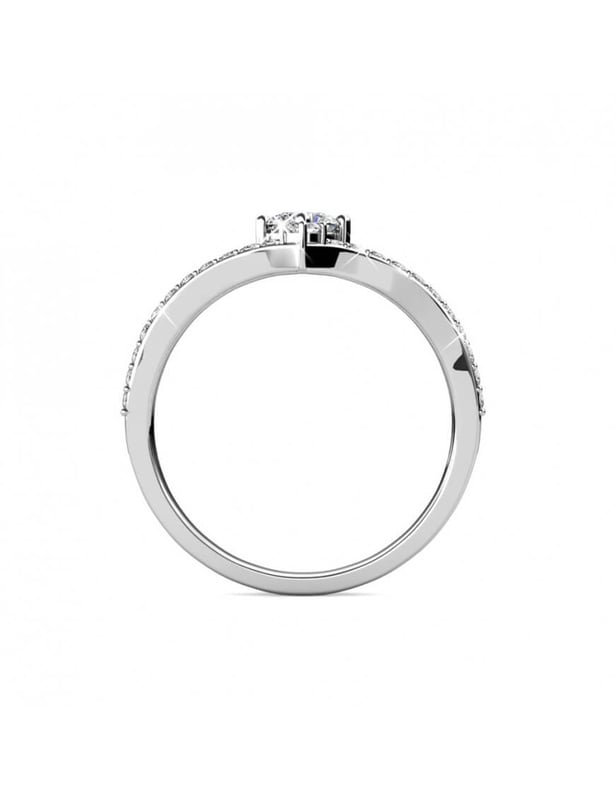 Var gudomlig med vår Zinnia-ring. Dess vackra finish och kvalitetskristaller kommer att förföra dig. Den perfekta presenten till er damer.