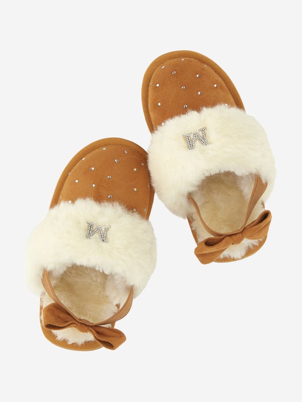 Monnalisa incorporate passion and innovation into their beautifully crafted designs. These girls suede slippers in beige are perfect for every fashionista. Engineered in luxurious detail with all-over rhinestones, a plush edging, platform sole and elastic with a bow. Inspired by coquette fashion, she will be obsessed. Inner With Rhinestone Logo
