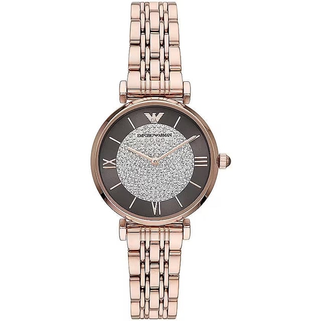 Brand: Emporio Armani
  Series: Gianni T-Bar
  Gender: Ladies
  Model: AR11402
  Movement: Quartz
  Case Size: 32mm
  Case Thickness: 8mm
  Case Material: Stainless Steel
  Case Shape: Round
  Case Back: Solid
  Band Material: Stainless Steel
  Band Type: Bracelet
  Band Color: Rose Gold-tone
  Band Width: 14mm
  Clasp: Butterfly
  Dial Color: Brown (Crystal Pave)
  Type: Analog
  Crystal: Scratch Resistant Mineral
  Hands: Rose Gold-tone
  Dial Markers: Index
  Second Markers: Roman Numerals appear at the 3 6 and 9 oclock positions
  Bezel: Fixed
  Bezel Material: Stainless Steel
  Crown: Pull/Push
  Water Resistance: 30 meters / 100 feet
  Functions: Hour Minute
  Watch Features: Stainless Steel Gold Analog
  Watch Style: Dress
  Code: AR11402
Material: Steel