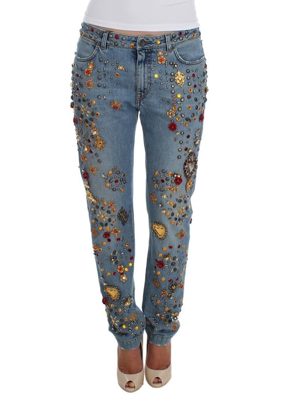 Gorgeous brand new Dolce & Gabbana blue wash crystal heart Roses embellished enchanted Sicily boyfriend fit jeans
  Made from a blend of 69% cotton 15% brass 5% crystal 5% zama 3% plastic 2% glass and 1% elastane
  Light blue wash with gold and silver metal detailing
  Zipper and button fly closure
  Multicolor crystal embellishments
  Two front pockets and back pockets
  Logo details
  Made in Italy
  Exclusive and rare one of a kind pair of jeans
Material: 69% Cotton 15% Brass 5% Crystal 5% Zama 3% Plastic 2% Glass 1% Elastane