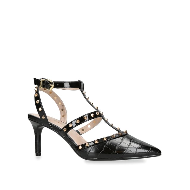 The Carvela Samba Court heel features a black upper with statement gold studs across the straps. The enclosed toe is pointed and the heel is in a stiletto style. Heel height: 70mm.