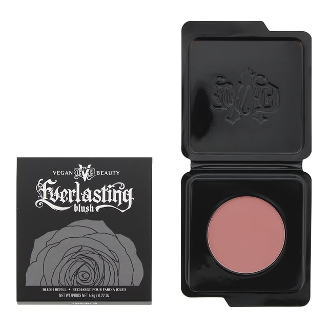 KVD Everlasting Refill Blush is a high-quality blush formula that delivers long-lasting, vibrant color to your cheeks. This refillable blush is part of the KVD Everlasting Blush collection, known for its exceptional pigmentation and smooth application. The blush is finely milled and blends effortlessly onto the skin, providing a soft and natural-looking flush of color. It is available in a range of shades to suit different skin tones and preferences, from subtle neutrals to bold and vibrant hues. Whether you prefer a soft, romantic glow or a bold pop of color, the KVD Everlasting Refill Blush has options to help you achieve your desired look. The formula is buildable, allowing you to customise the intensity of the blush. Whether you prefer a sheer wash of color or a more dramatic effect, you can easily layer the product to achieve your desired level of pigmentation. The blush has a velvety texture that blends seamlessly into the skin, leaving a smooth and flawless finish.  Not only does the KVD Everlasting Refill Blush provide beautiful color, but it is also formulated to be long-lasting. The blush stays put throughout the day, resisting fading or smudging, so you can enjoy a fresh and radiant look for hours.