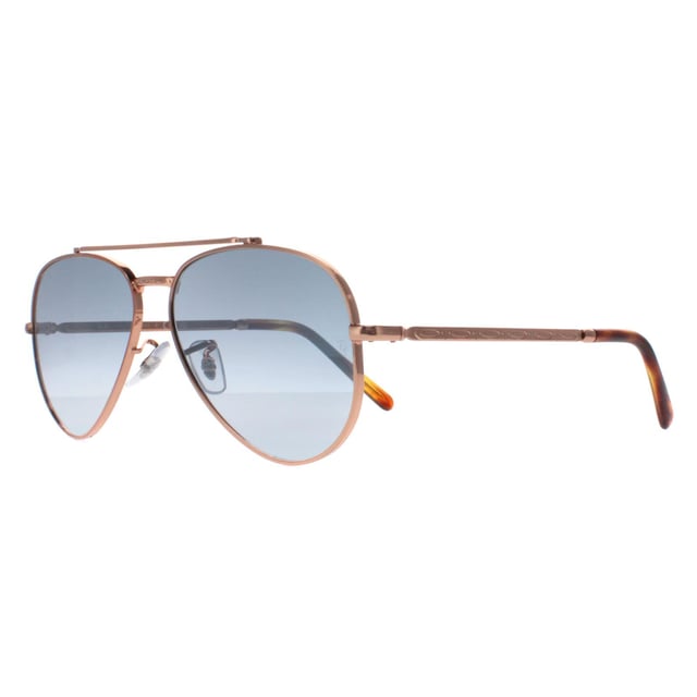 Ray-Ban Aviator Unisex Oro rosa pulido Gradiente azul RB3625 Las nuevas gafas de sol de aviador son una fusión de diseño clásico e innovación moderna. Con un guiño a la icónica silueta de aviador, estas gafas de sol presentan una elegante montura metálica y un atrevido puente doble, que aportan un toque contemporáneo a un estilo muy apreciado. Las lentes actualizadas, ligeramente cuadradas, ofrecen una nueva perspectiva de la tradicional forma de aviador, que irradia confianza y sofisticación. Fabricadas con precisión y atención al detalle, estas gafas de sol no sólo son una declaración de moda, sino que también proporcionan una protección UV excepcional, garantizando tanto el estilo como la seguridad ocular.