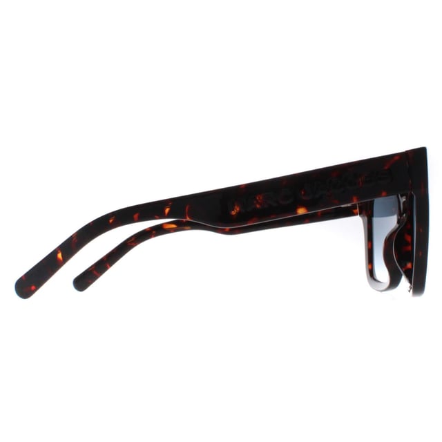 Marc Jacobs Square Womens Shiny Dark Havana Blue Gradient MARC 658/S  Sunglasses feature a sleek and contemporary design with a nod to timeless style. Crafted with meticulous attention to detail, the frame showcases a blend of modern lines and classic elements, complemented by high-quality materials that promise both durability and comfort. The lenses not only offer optimal protection against harmful UV rays but also contribute to the sunglasses' undeniable allure. Finished with the iconic Marc Jacobs branding, these sunglasses effortlessly merge fashion forward aesthetics with everyday functionality, becoming an essential accessory for those who appreciate tasteful design and impeccable quality.