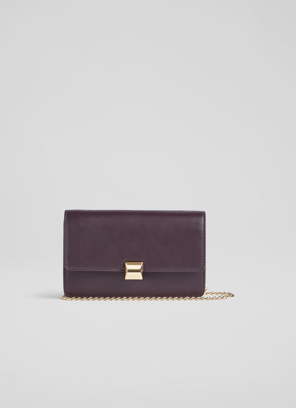 Designed to go smart, casual and all those marvellous moments in-between, the new Otto shoulder bag in our LKB Conscious collection does them all. Crafted from soft and supple vegan apple leather* in a rich shade of Bordeaux, it has a simple fold-over design with a chic gold clasp, a removable gold chain shoulder strap and apple leather wrist strap. Inside there's a handy mirror and a zip across section. Hang it over your wrist, wear it over your shoulder or hold it like a clutch, Otto is very versatile.