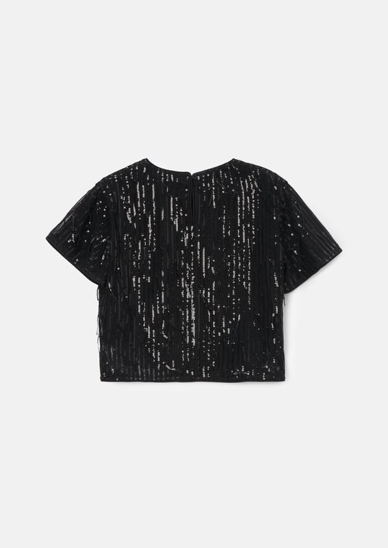 Glitter. shimmer and sparkle in our fabulous short sleeve shell top in elegant  . With swishy sequin tassels. you'll make an entrance to any party. Wear with the matching trouser for ultimate outfit credits.