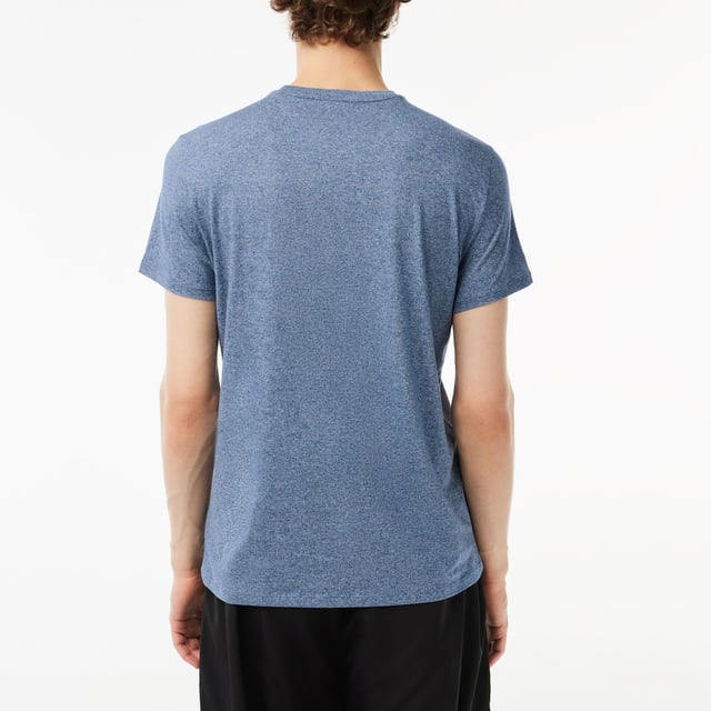 Mens Lacoste Crew Neck Pima Cotton Jersey T-Shirt in blue.- Ribbed crew neck.- Short sleeves.- Embroidered Lacoste logo at left chest.- Tonal back neck tape.- Super soft pima cotton jersey fabric.- Regular fit.- 100% Cotton.  - Ref: TH6709-1GF