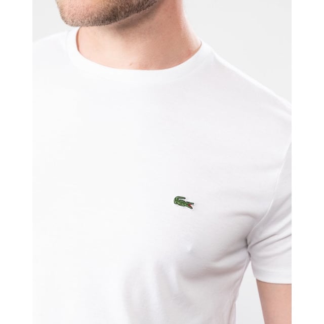 Soft premium Pima cotton jersey in your choice of vibrant tones makes this tee irresistible. Add this sure shot to your own capsule collection.

Cotton 100%
Pima Cotton jersey
Crew neck
Regular fit
Transfer branding on neckband lining
Embroidered Green Crocodile branding on chest