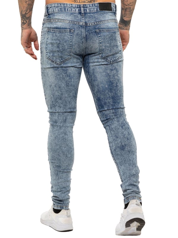 Enzo Mens Skinny Stretch rasgó los jeans angustiados. Efecto de rasgadura y reparación, cierre de mosca Zip. Dos bolsillos delanteros, dos bolsillos traseros, bolsillo de una sola moneda. Remaches y botones de marca.