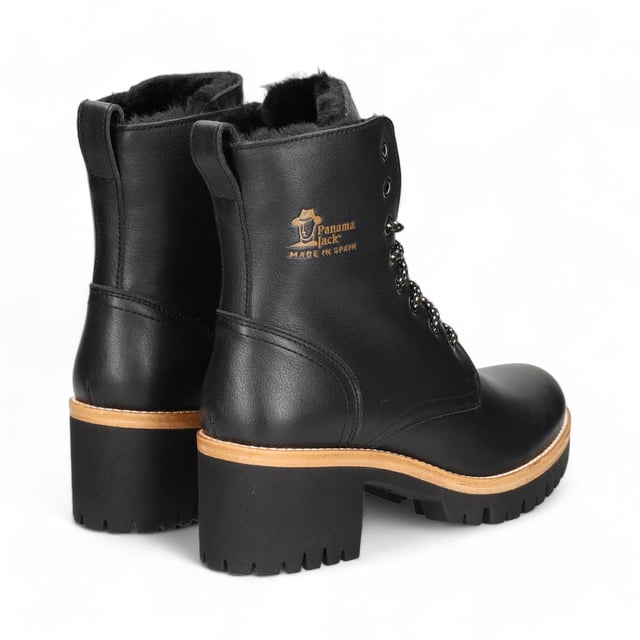 The Padma B11 women's boots from Panama Jack are the perfect blend of comfort, warmth, and style. Crafted from waterproof black Napa leather, these boots are designed to withstand wet weather while maintaining a sleek, fashionable look. The warm fur lining ensures cozy insulation, while the removable anatomical insole provides long-lasting comfort. With a natural, flexible, and durable rubber sole, these boots offer excellent support and grip. Featuring a lace closure for a secure fit, a shaft height of 15 cm, and a heel height of 6 cm, these boots are ideal for both casual and outdoor wear.

Features:

Waterproof black Napa leather
Warm fur lining for insulation
Removable anatomical insole
Natural, flexible, and durable rubber sole
Lace closure for a secure fit
Shaft height: 15 cm
Heel height: 6 cm
100% Made in Spain