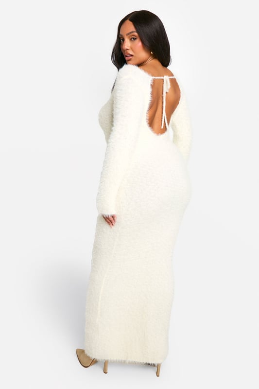 A longline style that lengthens your silhouette and skims your curves for a super flattering look, create the fit you've been dreaming of this season with this plus size maxi dress. A versatile piece you can dress up with heels or keep casual with sliders, plus size long dresses are a wardrobe saviour when you don't know what to wear. Updated for the new season with floral prints, as well as some jersey pieces to keep your lounge style on lock, invest in a plus size floor length dress (it will look good on you).Style: Knitted DressFabric: AcrylicLength: MaxiSleeve Length: Long Sleeve