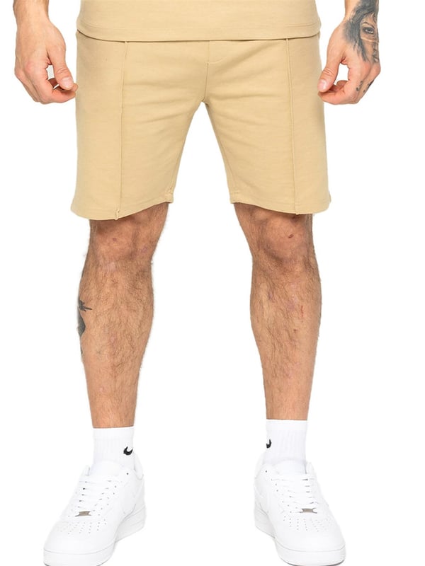 Enzo Mens Casual Stretch Shorts offer comfort and convenience with 2 side & 2 back pockets, elastic waistband & adjustable drawstring, and front pin tuck seam detail for added style and functionality. Perfect for errands or lounging with a practical and stylish design.