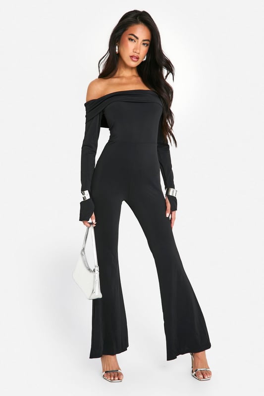 On the hunt for the perfect new-season piece? This bardot jumpsuit is just for you. Sitting off the shoulder for a flattering fit, an off the shoulder jumpsuit is the perfect addition to your summer collection. Curve accentuating, shoulder enhancing, and super easy on the eye, this style seriously brings the heat. From classic black bardot jumpsuits with ruffle detailing to white bardot jumpsuits perfect for long summer days, we've got you covered. Just add strappy sandals and you're ready to go. Style: UnitardFabric: SlinkyLength: RegularNeckline: BardotSleeve Length: Long Sleeve
