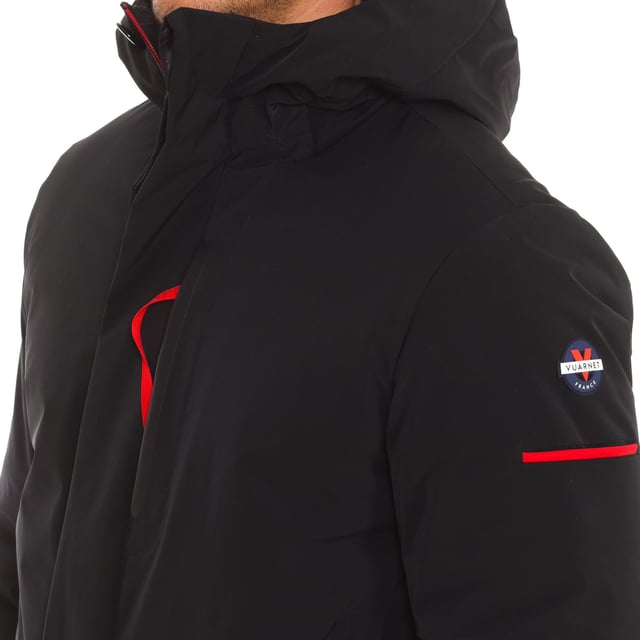 Waterproof jacket Vuarnet.
 High collar with hood.
 Two-way zipper and button closure.
 One button pocket on the sleeve.
 One zipper pocket on the upper front side.
 Two zippered hand pockets
 One internal zipper pocket.
 Brand logo on one sleeve.
 Composition: 100% Sorona
 Care:
Wash at maximum temperature 30º.
 Do not iron.
 Do not use dryer.
 Do not use bleach.
 Do not dry clean.