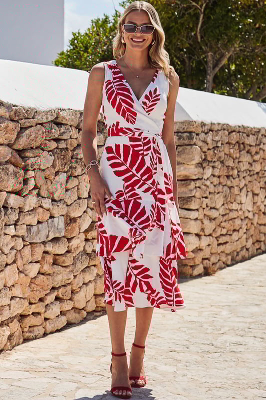 Introducing the one-piece wonder you'll be wearing all summer
Nothing flatters like a wrap dress
It's bra friendly
Dreamy tiered midi hem
Splashed with a mood-boosting palm print
Take it from day to night by switching sandals for heels