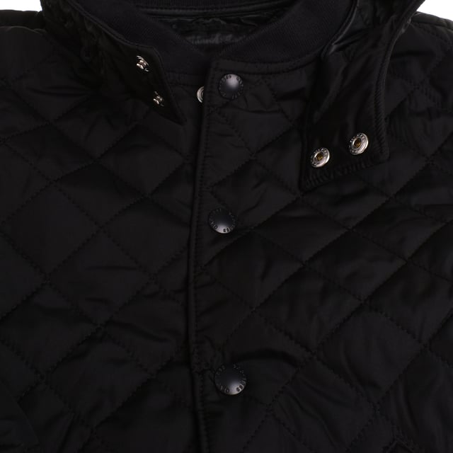 Unisex jacket for children in collaboration with Disney, with charming decorative quilting that adds style and warmth.

 It features a snap front closure for ease of use and a high, stretch-knit collar that offers additional protection in cold weather.

 The detachable hood with fun ears adds a playful and practical touch, allowing for styling options.

 Ribbed sleeves ensure a comfortable fit, and the straight cut provides freedom of movement.

 Plus, it features functional slanted pockets, making it an ideal garment for both everyday use and for keeping little ones warm and comfortable.
 Composition: Shell: 100% Polyester; Lining: Acrylic; Filling: 100% Polyester
 Care:
- Machine wash cold on delicate cycle.
 - Use mild detergents.
 - Use dryer at low temperature.
 - Iron at low temperatures.
 - Do not dry clean.