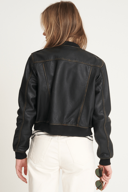 Introducing the Barneys Originals Washed Cropped Bomber Jacket – a fusion of contemporary style and timeless appeal. Crafted with textured leather, this jacket not only adds an edgy dimension but also offers a unique tactile experience. The cropped design adds a modern twist to the classic bomber silhouette, making it a versatile choice for any occasion. The washed finish lends a vintage charm, ensuring that each piece is distinctively yours. Elevate your fashion game with this Barneys Originals jacket – where texture meets trendsetting in a cropped bomber masterpiece.