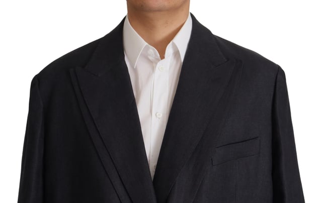 Model: Blazer jacket sport coat
  Style: Double breasted one button
  Fitting: Slim
  Colour: Dark blue
  Three outside pockets and two inside pockets
  One open vent in the back
  Logo details
  Made in Italy
  Material: 100% Linen
  Lining: 100% Silk
Material: 100% Linen