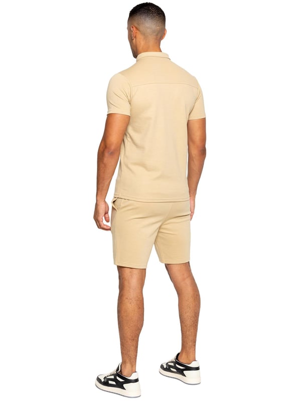Enzo Mens Collared Polo Tracksuit Set. Collared, ¼ Zip, Short Sleeve Polo. Stitched Trims At Sleeve & Hem. Stretch Fabric For Extra Comfort. Finished with Stretch Shorts. 2 Side Pockets, 2 Back Welt Pockets. Elasticated Waistband With Adjustable Drawstring. Front Pin Tuck Seam