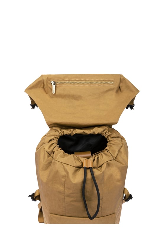 Cut from our signature nylon, the Flapover Nylon Backpack’s adjustable flap over opening provides easy access to your essentials with a secure double clip fastening. Inside there is ample space for a 15” laptop, twinned with external front and rear pockets for additional storage options. Features: , Flap over opening, Internal drawstring opening Front flap over zip pocket, Rear zip pocket, Internal flap over zip pocket SMITH & CANOVA antique brass logo, Branded antique brass zips, Padded grab handle, Adjustable padded backpack straps, Internal 15 inch padded laptop sleeve, Internal zip pocket, 2 Internal mobile phone slip pockets - fits normal and plus size smart phones, 2 Internal pen slip pockets Style Ref: 92680 TAN